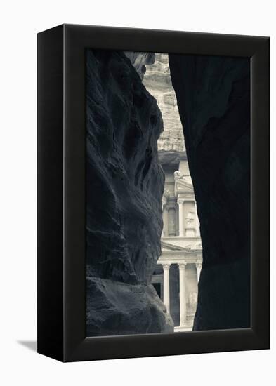 First glimpse of the red sandstone walls of Al-Khazneh (the Treasury), viewed through the narrow...-null-Framed Premier Image Canvas