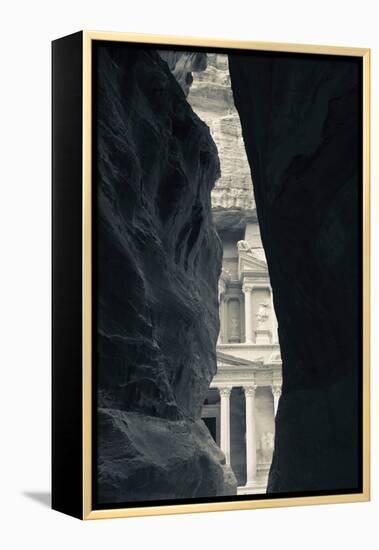 First glimpse of the red sandstone walls of Al-Khazneh (the Treasury), viewed through the narrow...-null-Framed Premier Image Canvas
