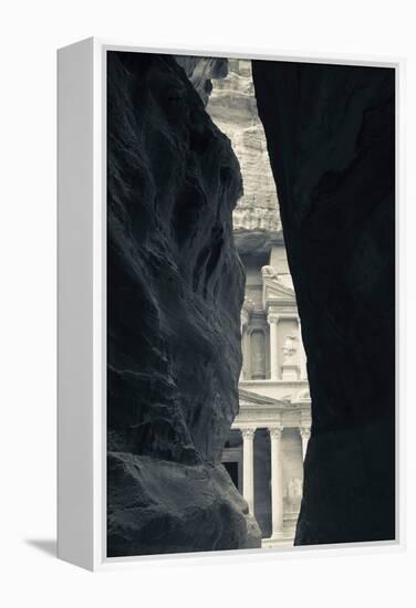 First glimpse of the red sandstone walls of Al-Khazneh (the Treasury), viewed through the narrow...-null-Framed Premier Image Canvas