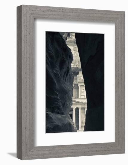 First glimpse of the red sandstone walls of Al-Khazneh (the Treasury), viewed through the narrow...-null-Framed Photographic Print