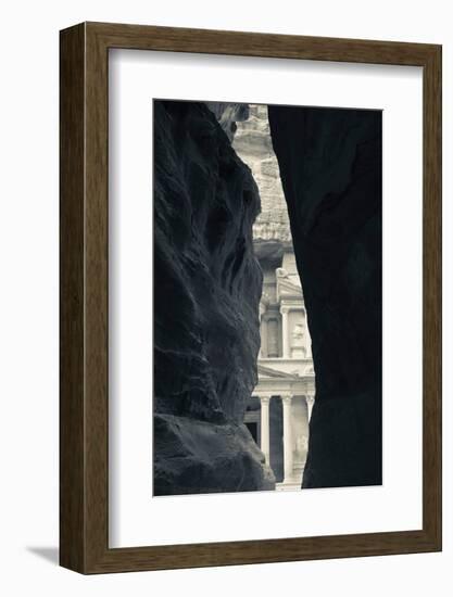 First glimpse of the red sandstone walls of Al-Khazneh (the Treasury), viewed through the narrow...-null-Framed Photographic Print