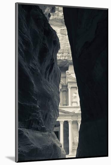 First glimpse of the red sandstone walls of Al-Khazneh (the Treasury), viewed through the narrow...-null-Mounted Photographic Print