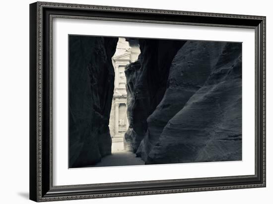 First glimpse of the red sandstone walls of Al-Khazneh (the Treasury), viewed through the narrow...-null-Framed Photographic Print