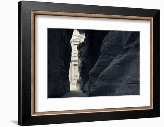 First glimpse of the red sandstone walls of Al-Khazneh (the Treasury), viewed through the narrow...-null-Framed Photographic Print