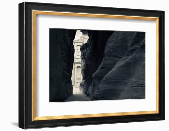 First glimpse of the red sandstone walls of Al-Khazneh (the Treasury), viewed through the narrow...-null-Framed Photographic Print