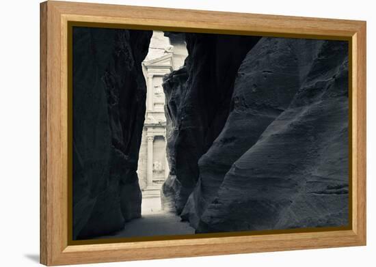 First glimpse of the red sandstone walls of Al-Khazneh (the Treasury), viewed through the narrow...-null-Framed Premier Image Canvas