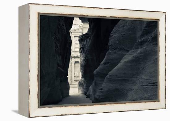 First glimpse of the red sandstone walls of Al-Khazneh (the Treasury), viewed through the narrow...-null-Framed Premier Image Canvas