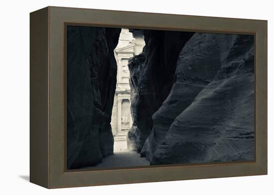 First glimpse of the red sandstone walls of Al-Khazneh (the Treasury), viewed through the narrow...-null-Framed Premier Image Canvas