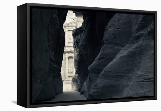 First glimpse of the red sandstone walls of Al-Khazneh (the Treasury), viewed through the narrow...-null-Framed Premier Image Canvas