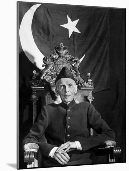 First Gov. Gen. of Independent Pakistan Mohammed Ali Jinnah Sitting in Front of Pakistani Flag-Margaret Bourke-White-Mounted Photographic Print