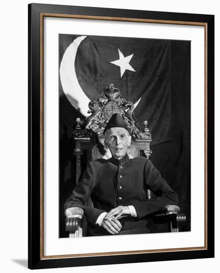 First Gov. Gen. of Independent Pakistan Mohammed Ali Jinnah Sitting in Front of Pakistani Flag-Margaret Bourke-White-Framed Photographic Print