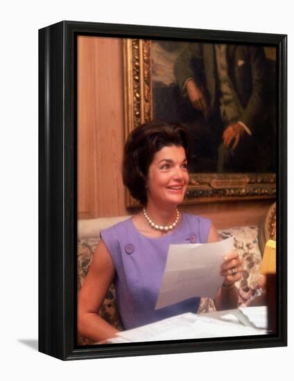 First Lady Jacqueline Kennedy Looking over Some Papers at the White House-Ed Clark-Framed Premier Image Canvas