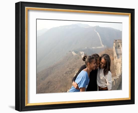 First Lady Michelle Obama and Daughters Sasha and Malia on the Great Wall of China-null-Framed Photo