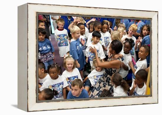 First Lady Michelle Obama Greets Children at Naval Air Station Oceana Summer Camp-null-Framed Stretched Canvas
