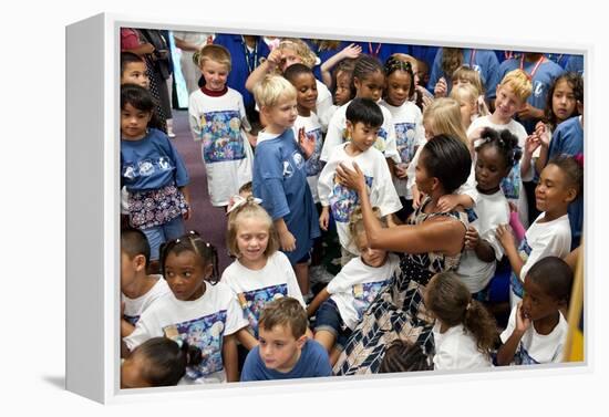 First Lady Michelle Obama Greets Children at Naval Air Station Oceana Summer Camp-null-Framed Stretched Canvas