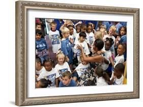 First Lady Michelle Obama Greets Children at Naval Air Station Oceana Summer Camp-null-Framed Photo