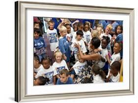 First Lady Michelle Obama Greets Children at Naval Air Station Oceana Summer Camp-null-Framed Photo