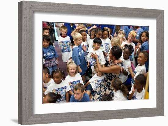 First Lady Michelle Obama Greets Children at Naval Air Station Oceana Summer Camp-null-Framed Premium Photographic Print