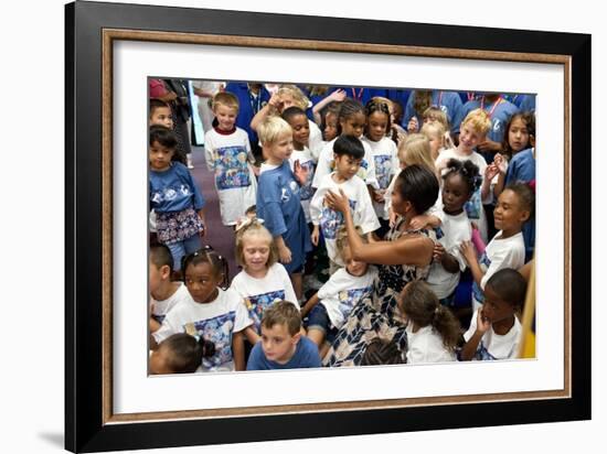First Lady Michelle Obama Greets Children at Naval Air Station Oceana Summer Camp-null-Framed Premium Photographic Print