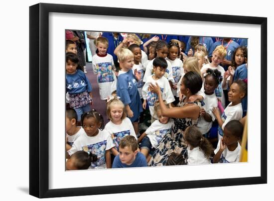 First Lady Michelle Obama Greets Children at Naval Air Station Oceana Summer Camp-null-Framed Premium Photographic Print