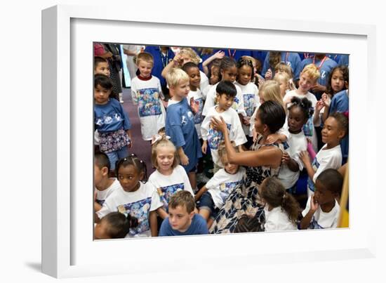 First Lady Michelle Obama Greets Children at Naval Air Station Oceana Summer Camp-null-Framed Premium Photographic Print