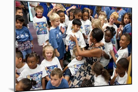 First Lady Michelle Obama Greets Children at Naval Air Station Oceana Summer Camp-null-Mounted Premium Photographic Print