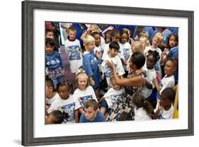 First Lady Michelle Obama Greets Children at Naval Air Station Oceana Summer Camp-null-Framed Photo