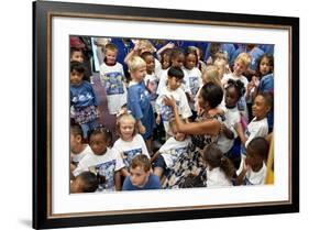 First Lady Michelle Obama Greets Children at Naval Air Station Oceana Summer Camp-null-Framed Photo