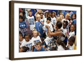 First Lady Michelle Obama Greets Children at Naval Air Station Oceana Summer Camp-null-Framed Photo
