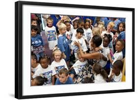 First Lady Michelle Obama Greets Children at Naval Air Station Oceana Summer Camp-null-Framed Photo