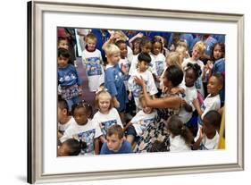 First Lady Michelle Obama Greets Children at Naval Air Station Oceana Summer Camp-null-Framed Photo