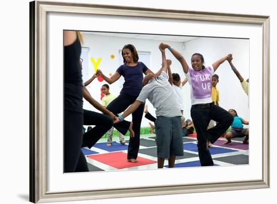 First Lady Michelle Obama Joins an after School 'Let's Move!' Yoga Class after School Activities-null-Framed Photo