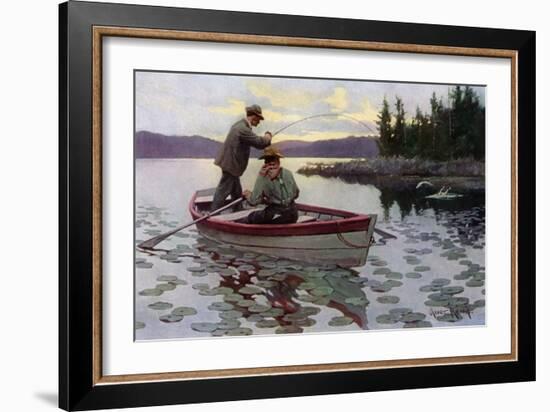 Fisherman Fighting to Land a Muskie on a northern Lake, 1900s-null-Framed Giclee Print