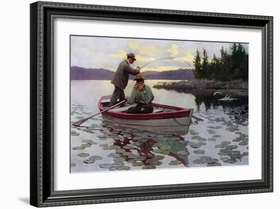 Fisherman Fighting to Land a Muskie on a northern Lake, 1900s-null-Framed Giclee Print