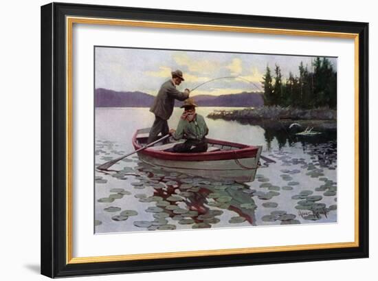 Fisherman Fighting to Land a Muskie on a northern Lake, 1900s-null-Framed Giclee Print