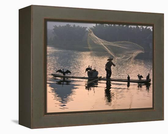 Fisherman Fishing with Cormorants on Bamboo Raft on Li River at Dusk, Yangshuo, Guangxi, China-Keren Su-Framed Premier Image Canvas