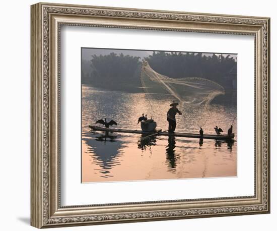 Fisherman Fishing with Cormorants on Bamboo Raft on Li River at Dusk, Yangshuo, Guangxi, China-Keren Su-Framed Photographic Print