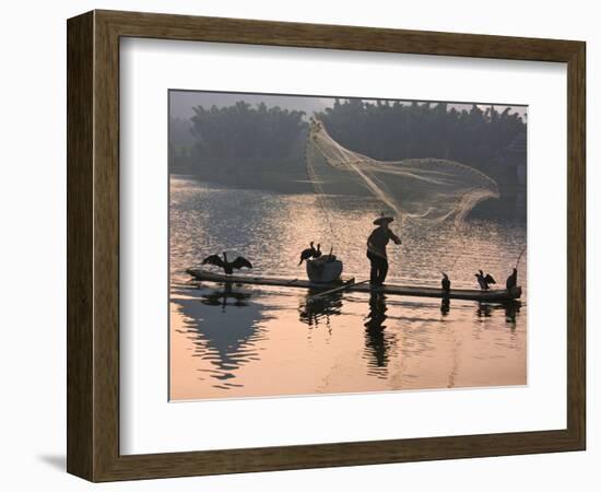 Fisherman Fishing with Cormorants on Bamboo Raft on Li River at Dusk, Yangshuo, Guangxi, China-Keren Su-Framed Photographic Print