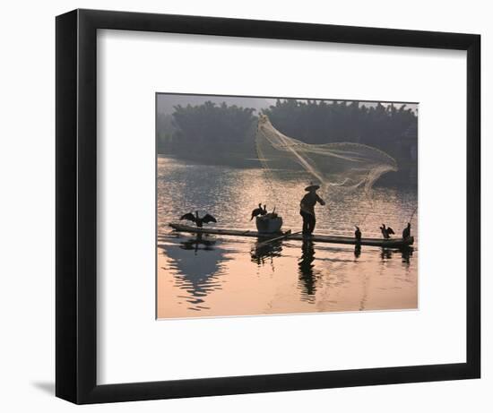 Fisherman Fishing with Cormorants on Bamboo Raft on Li River at Dusk, Yangshuo, Guangxi, China-Keren Su-Framed Photographic Print