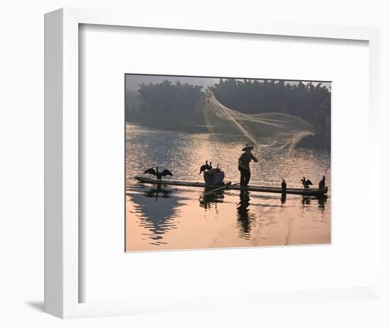 Fisherman Fishing with Cormorants on Bamboo Raft on Li River at Dusk, Yangshuo, Guangxi, China-Keren Su-Framed Photographic Print