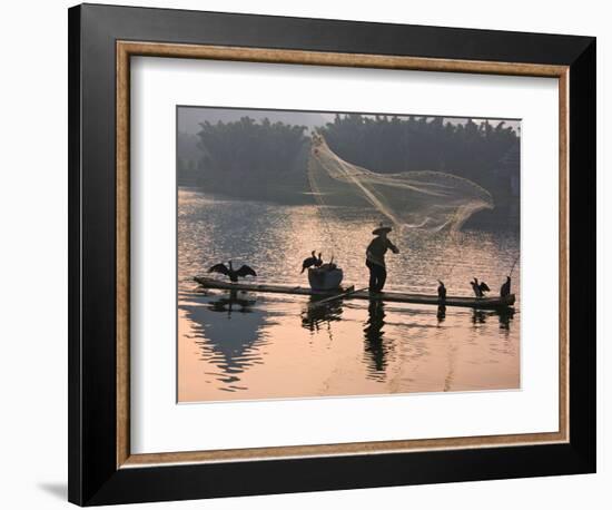 Fisherman Fishing with Cormorants on Bamboo Raft on Li River at Dusk, Yangshuo, Guangxi, China-Keren Su-Framed Photographic Print