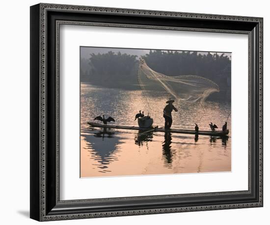 Fisherman Fishing with Cormorants on Bamboo Raft on Li River at Dusk, Yangshuo, Guangxi, China-Keren Su-Framed Photographic Print