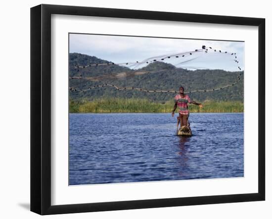 Fisherman in Dugout Canoe Casts Net in Shire River, Lake Malawi's Only Outlet, Southern End of Lake-Nigel Pavitt-Framed Photographic Print