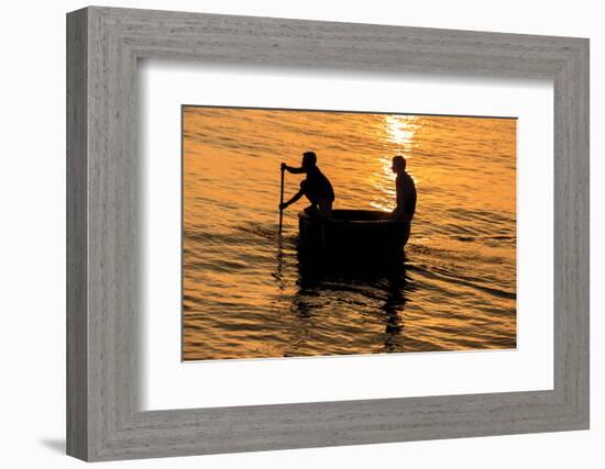 Fisherman Landing the Night Catch. Vietnam, Indochina-Tom Norring-Framed Photographic Print