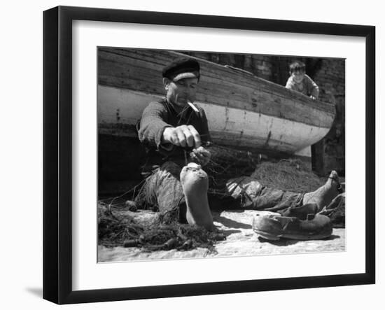 Fisherman Mending His Nets-Carl Mydans-Framed Photographic Print