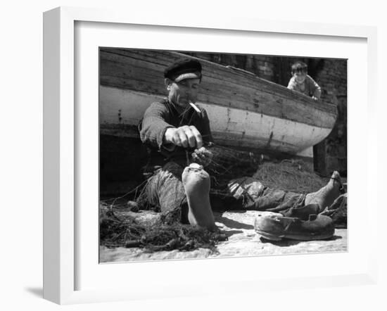 Fisherman Mending His Nets-Carl Mydans-Framed Photographic Print