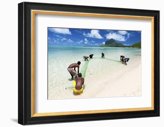 Fisherman on a Beach Being Overlooked by the Basaltic Monolith, Indian Ocean-Jordan Banks-Framed Photographic Print