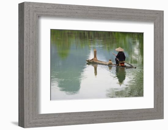 Fisherman on bamboo raft on Mingshi River with karst hills, Mingshi, Guangxi Province, China-Keren Su-Framed Photographic Print