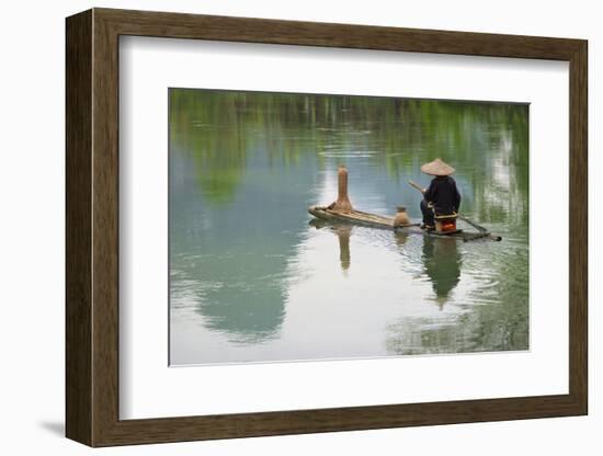 Fisherman on bamboo raft on Mingshi River with karst hills, Mingshi, Guangxi Province, China-Keren Su-Framed Photographic Print