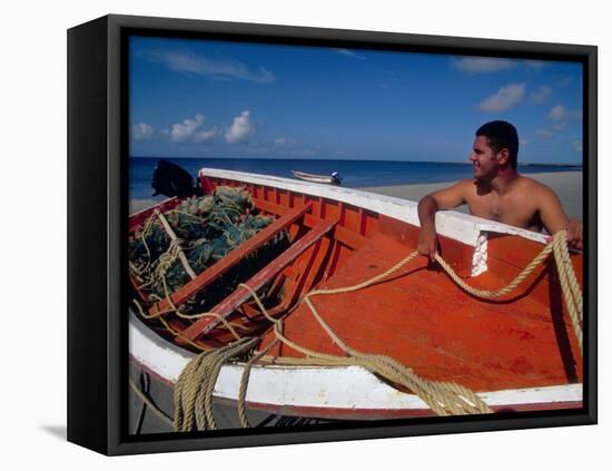 Fisherman Tends His Boat on the Beach, Isla Margarita, Venezuela-Greg Johnston-Framed Premier Image Canvas